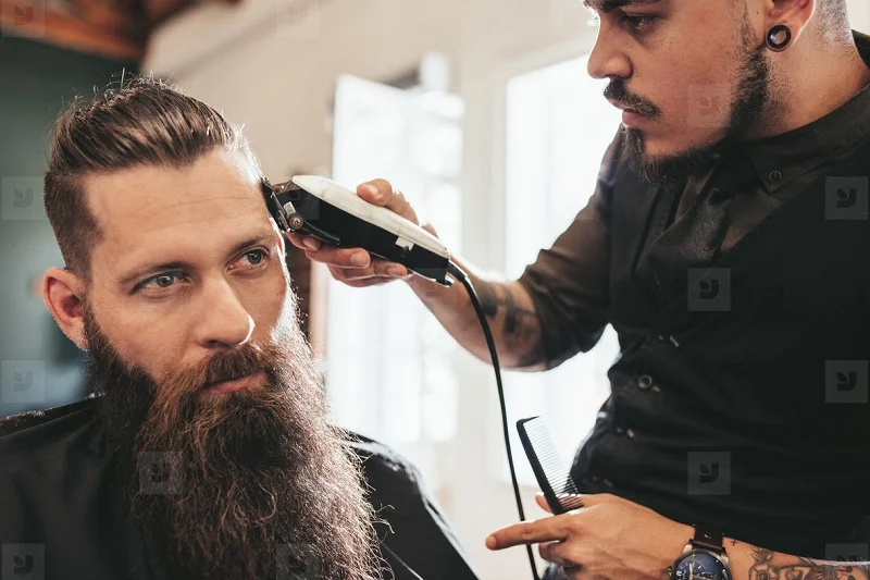 Haircut and beard trim for a male guest