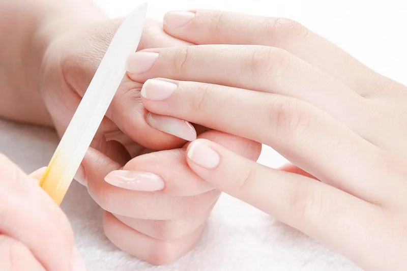 Warm oil poured over the leg during a spa pedicure
